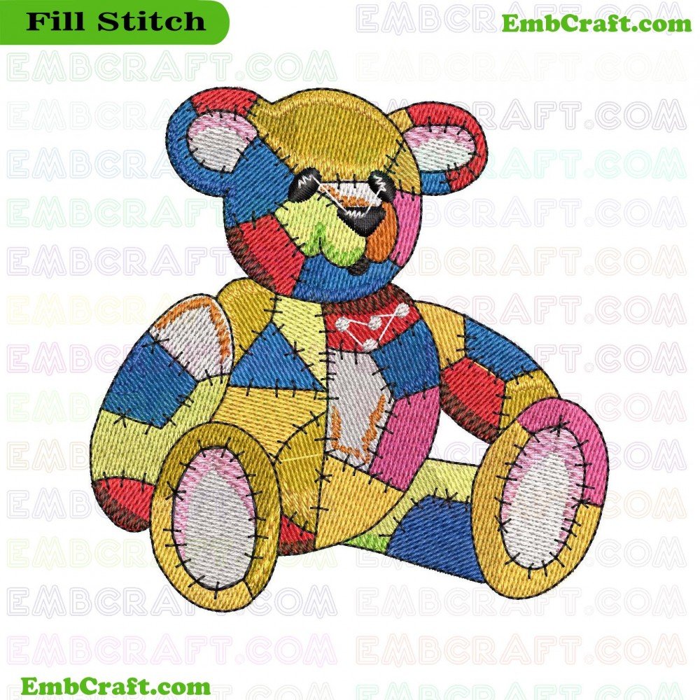 A handcrafted teddy bear made from multi-colored and patterned fabric pieces.